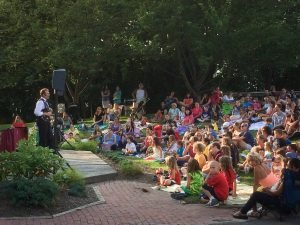 Photo of Long Island Magician, Mike Maione AKA the Silly Magician performing an outdoor magic show.